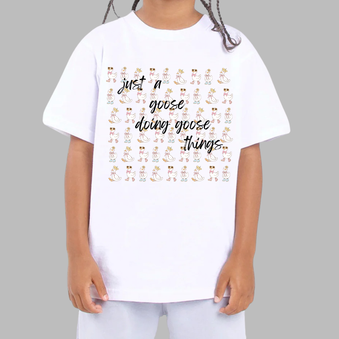Flock to School in Style! Get ready for a quack-tastic school year with our adorable "Kindergarten Goose" tee!